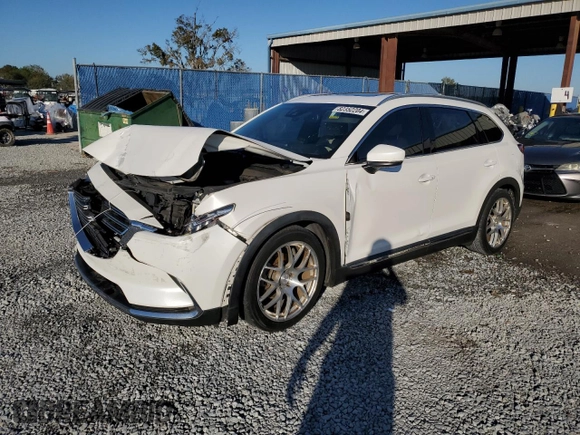 2017 Mazda CX-9 Grand Touring z VIN JM3TCADYXH0127867, wystawiony jako Copart lot #82352204 z przebiegiem 129 349 mil mil oraz Szkoda całkowita • Salvage title. Historia ofert i sprzedaży dostępna na DreamBid. Obrazek 1.