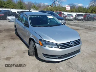 2015 Volkswagen Passat 1.8T Limited Edition with VIN 1VWAT7A32FC043594, listed as a IAAI auction lot 41867799 with 195,144 mi miles. Bid and sale history available at carsss.com. Image 1.