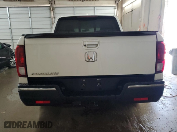 2019 Honda Ridgeline RTL-T with VIN 5FPYK2F60KB001455, listed as a Copart auction lot 53786015 with 61,050 mi miles and Salvage title. Bid and sale history available at DreamBid. Image 6.