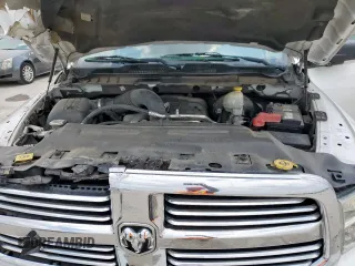 2015 Ram 1500 Outdoorsman with VIN 1C6RR6LT2FS559639, listed as a Copart auction lot 55867495 with 210,216 mi miles and Salvage title. Bid and sale history available at DreamBid. Image 11.