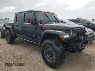 2022 Jeep Gladiator Rubicon with VIN 1C6JJTBG5NL101657, listed as a Copart auction lot 74682144 with 13,352 mi miles and Non repairable. Bid and sale history available at DreamBid. Image 4.