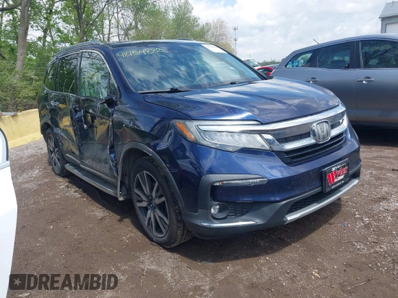 2019 Honda Pilot Touring 7-Passenger z VIN 5FNYF6H63KB000365, wystawiony jako IAAI lot #42154822 z przebiegiem 238 032 mil mil oraz . Historia ofert i sprzedaży dostępna na DreamBid. Obrazek 1.