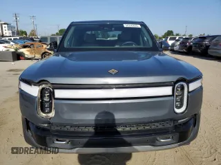 2022 Rivian R1T Adventure z VIN 7FCTGAAA9NN008771, wystawiony jako Copart lot #56243835 z przebiegiem 31 006 mil mil oraz Szkody całkowita. Historia ofert i sprzedaży dostępna na DreamBid. Obrazek 5.