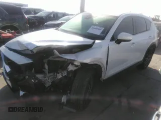 2018 Mazda CX-5 Grand Touring with VIN JM3KFADM4J0309540, listed as a IAAI auction lot 41868480 with 89,110 mi miles. Bid and sale history available at carsss.com. Image 18.