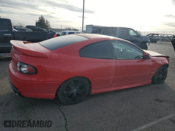 2006 Pontiac GTO z VIN 6G2VX12U06L561062, wystawiony jako Copart lot #44526895 z przebiegiem 73 242 mil mil oraz Szkody całkowita. Historia ofert i sprzedaży dostępna na DreamBid. Obrazek 3.