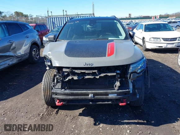 2022 Jeep Compass Trailhawk with VIN 3C4NJDDB4NT136213, listed as a IAAI auction lot 41689612 with 50,091 mi miles and . Bid and sale history available at DreamBid. Image 12.