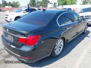 2015 BMW 7 Series 740Li with VIN WBAYE4C57FD138961, listed as a IAAI auction lot 42216122 with 224,740 mi miles and . Bid and sale history available at carsss.com. Image 4.