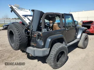 2012 Jeep Wrangler Sahara z VIN 1C4AJWBG1CL216425, wystawiony jako Copart lot #48377825 z przebiegiem 99 649 mil mil oraz Szkoda całkowita • Salvage title. Historia ofert i sprzedaży dostępna na DreamBid. Obrazek 3.