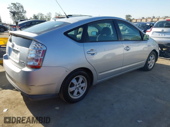 2007 Toyota Prius z VIN JTDKB20U477567380, wystawiony jako IAAI lot #42323632 z przebiegiem 193 349 mil mil oraz . Historia ofert i sprzedaży dostępna na DreamBid. Obrazek 4.