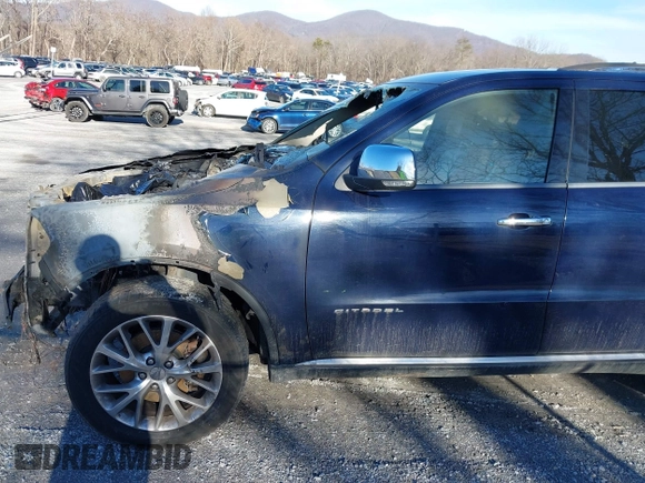 2014 Dodge Durango Citadel with VIN 1C4RDJEG0EC125643, listed as a IAAI auction lot 41461080 with Not Provided miles and . Bid and sale history available at DreamBid. Image 11.