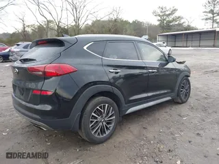 2021 Hyundai Tucson Limited with VIN KM8J33ALXMU284737, listed as a IAAI auction lot 41305762 with 115,000 mi miles. Bid and sale history available at carsss.com. Image 4.