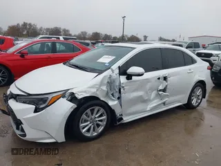 2024 Toyota Corolla Hybrid LE with VIN JTDBCMFE4RJ027221, listed as a IAAI auction lot 41084897 with 10,683 mi miles. Bid and sale history available at carsss.com. Image 6.