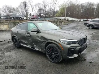 2023 BMW X6 xDrive40i z VIN 5UXCY6C03P9P48220, wystawiony jako Copart lot #51660845 z przebiegiem 24 947 mil mil oraz Szkoda całkowita • Salvage title. Historia ofert i sprzedaży dostępna na DreamBid. Obrazek 11.