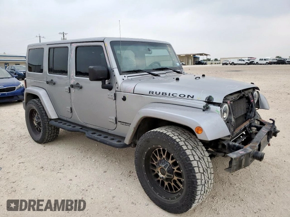 2014 Jeep Wrangler Unlimited Rubicon с VIN 1C4HJWFG3EL322449, выставлен на аукционе Copart как лот 57187665 с пробегом 122 469 миль миль и Списание • Salvage title. История ставок и продаж доступна на DreamBid. Изображение 4.