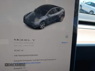 2023 Tesla Model Y Long Range with VIN 7SAYGDEE5PF882582, listed as a IAAI auction lot 42059015 with 10,567 mi miles and . Bid and sale history available at carsss.com. Image 18.