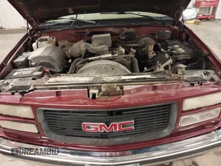 1999 GMC Yukon with VIN 1GKEK13R3XJ700930, listed as a IAAI auction lot 40915481 with 249,773 mi miles. Bid and sale history available at carsss.com. Image 10.
