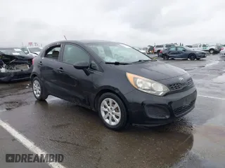 2013 Kia Rio LX with VIN KNADM5A35D6302623, listed as a IAAI auction lot 41626083 with 114,132 mi miles. Bid and sale history available at carsss.com. Image 1.