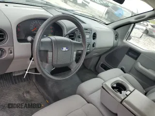 2006 Ford F-150 STX with VIN 1FTRF022X6KC52615, listed as a Copart auction lot 47594435 with 113,143 mi miles and Salvage Title. Bid and sale history available at carsss.com. Image 8.