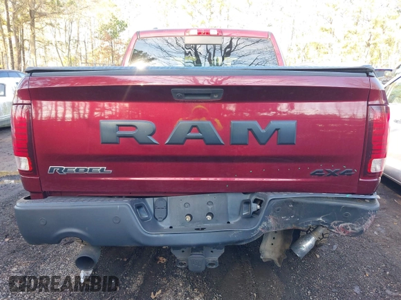 2017 Ram 1500 Rebel with VIN 1C6RR7YT6HS760106, listed as a IAAI auction lot 41671874 with 102,101 mi miles and . Bid and sale history available at DreamBid. Image 16.