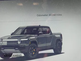 2022 Rivian R1T Launch Edition with VIN 7FCTGAAL9NN004060, listed as a IAAI auction lot 41637884 with 40,268 mi miles. Bid and sale history available at carsss.com. Image 16.