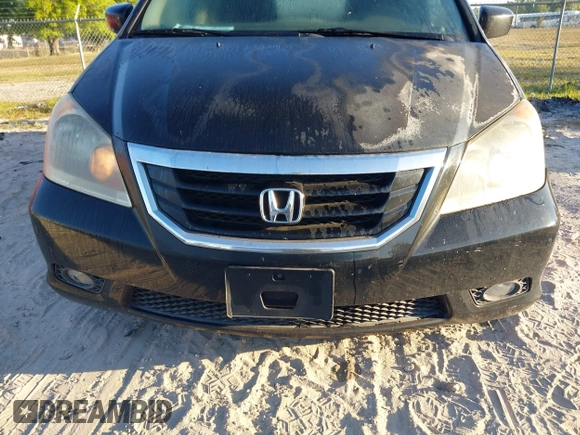 2010 Honda Odyssey Touring with VIN 5FNRL3H95AB031007, listed as a IAAI auction lot 41852435 with 207,919 mi miles. Bid and sale history available at carsss.com. Image 15.