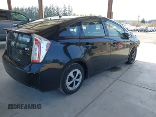 2015 Toyota Prius Four with VIN JTDKN3DU1F1899480, listed as a IAAI auction lot 42127015 with 247,659 mi miles and . Bid and sale history available at DreamBid. Image 4.