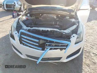 2014 Cadillac ATS Standard RWD z VIN 1G6AA5RA7E0128501, wystawiony jako IAAI lot #41780110 z przebiegiem 78 367 mil mil oraz . Historia ofert i sprzedaży dostępna na DreamBid. Obrazek 6.