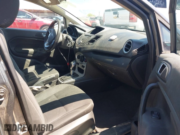 2015 Ford Fiesta SE with VIN 3FADP4BJ1FM217045, listed as a IAAI auction lot 42120444 with 119,207 mi miles and . Bid and sale history available at DreamBid. Image 5.