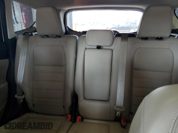 2018 Ford Escape Titanium с VIN 1FMCU9J90JUB30658, выставлен на аукционе Copart как лот 64001665 с пробегом 61 970 миль миль и Списание • Salvage title. История ставок и продаж доступна на DreamBid. Изображение 10.