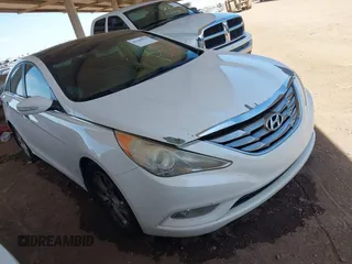 2012 Hyundai Sonata Limited z VIN 5NPEC4AC6CH407048, wystawiony jako IAAI lot #42340694 z przebiegiem 242 180 mil mil oraz . Historia ofert i sprzedaży dostępna na DreamBid. Obrazek 1.