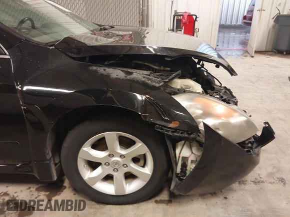 2007 Nissan Altima S with VIN 1N4AL21E77C144161, listed as a IAAI auction lot 42011479 with 175,942 mi miles and . Bid and sale history available at carsss.com. Image 18.