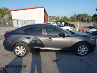2016 Mazda 3 i Sport with VIN 3MZBM1T70GM305353, listed as a IAAI auction lot 42101846 with 103,791 mi miles and . Bid and sale history available at DreamBid. Image 13.