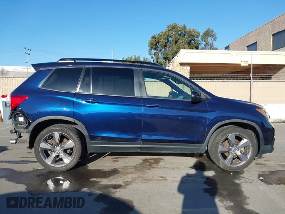 2020 Honda Passport Touring with VIN 5FNYF7H90LB004665, listed as a IAAI auction lot 41669821 with 59,768 mi miles and . Bid and sale history available at DreamBid. Image 14.