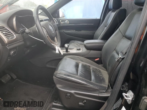 2014 Jeep Grand Cherokee Limited z VIN 1C4RJFBG4EC294770, wystawiony jako Copart lot #57468985 z przebiegiem 190 989 mil mil oraz Szkoda całkowita • Salvage title. Historia ofert i sprzedaży dostępna na DreamBid. Obrazek 7.