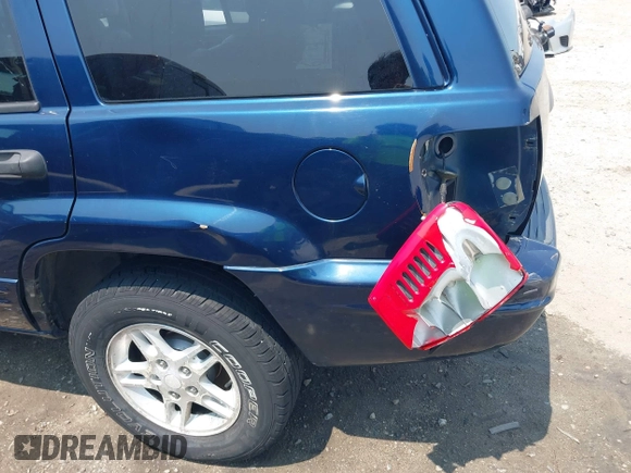 2002 Jeep Grand Cherokee Laredo with VIN 1J8GW48SX2C270339, listed as a IAAI auction lot 42390842 with Not provided miles and . Bid and sale history available at DreamBid. Image 16.