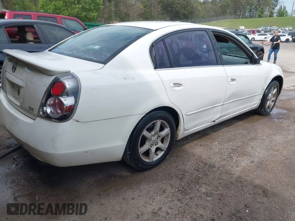 2002 Nissan Altima S with VIN 1N4AL11D92C137996, listed as a IAAI auction lot 42036830 with 227,793 mi miles. Bid and sale history available at carsss.com. Image 4.