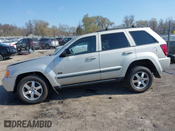 2008 Jeep Grand Cherokee Laredo with VIN 1J8GR48K28C169859, listed as a IAAI auction lot 41965149 with 166,069 mi miles. Bid and sale history available at carsss.com. Image 14.