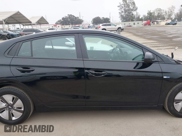 2020 Hyundai Ioniq Blue with VIN KMHC65LCXLU186010, listed as a IAAI auction lot 42019760 with 118,004 mi miles and . Bid and sale history available at DreamBid. Image 14.