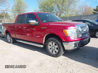 2011 Ford F-150 XLT with VIN 1FTFW1ET1BFB00545, listed as a IAAI auction lot 42142784 with 161,915 mi miles and . Bid and sale history available at DreamBid. Image 1.