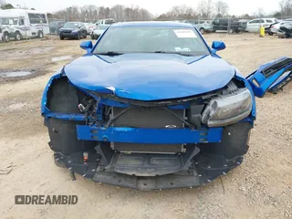 2017 Chevrolet Camaro 1LT z VIN 1G1FB1RX1H0144817, wystawiony jako IAAI lot #41609587 z przebiegiem 44 477 mil mil oraz . Historia ofert i sprzedaży dostępna na DreamBid. Obrazek 13.