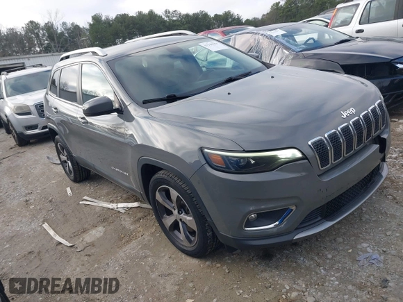 2020 Jeep Cherokee Limited with VIN 1C4PJLDBXLD502858, listed as a IAAI auction lot 41148184 with 73,509 mi miles. Bid and sale history available at carsss.com. Image 1.
