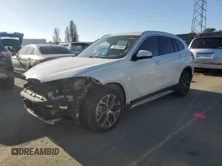 2021 BMW X1 xDrive28i with VIN WBXJG9C09M5S71263, listed as a Copart auction lot 46374565 with 61,537 mi miles and Salvage Title. Bid and sale history available at carsss.com. Image 1.