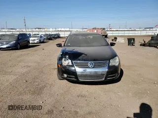 2009 Volkswagen Eos Lux с VIN WVWFA71F99V011940, выставлен на аукционе Copart как лот 48558885 с пробегом 75 242 миль миль и Списание • Salvage title. История ставок и продаж доступна на DreamBid. Изображение 11.
