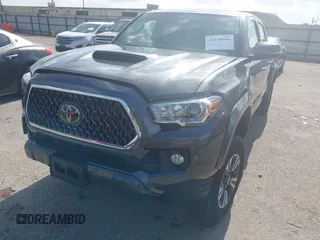 2018 Toyota Tacoma SR5 with VIN 3TMDZ5BN0JM051283, listed as a IAAI auction lot 42438690 with 106,155 mi miles and . Bid and sale history available at DreamBid. Image 17.