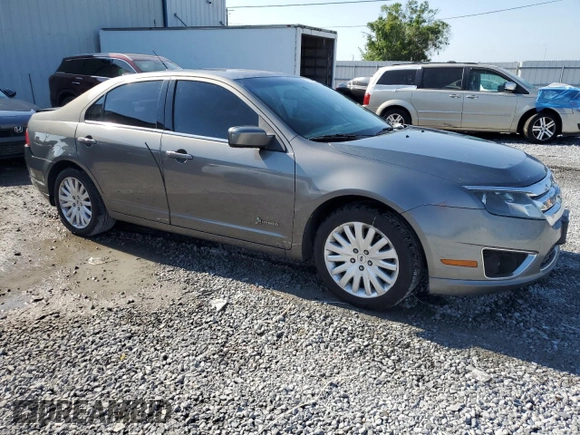 2010 Ford Fusion Hybrid with VIN 3FADP0L3XAR327449, listed as a Copart auction lot 54207225 with 192,659 mi miles and Salvage Title. Bid and sale history available at carsss.com. Image 4.
