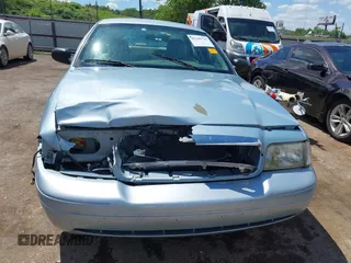 2008 Ford Crown Victoria z VIN 2FAFP73V28X126398, wystawiony jako IAAI lot #42349725 z przebiegiem Nie podano mil oraz . Historia ofert i sprzedaży dostępna na DreamBid. Obrazek 12.