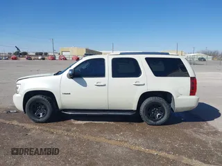 2012 Chevrolet Tahoe Commercial with VIN 1GNLC2E0XCR185593, listed as a IAAI auction lot 41781021 with 150,423 mi miles and . Bid and sale history available at DreamBid. Image 14.