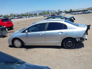 2007 Honda Civic with VIN JHMFA36257S021635, listed as a IAAI auction lot 42315202 with 233,394 mi miles and . Bid and sale history available at DreamBid. Image 15.
