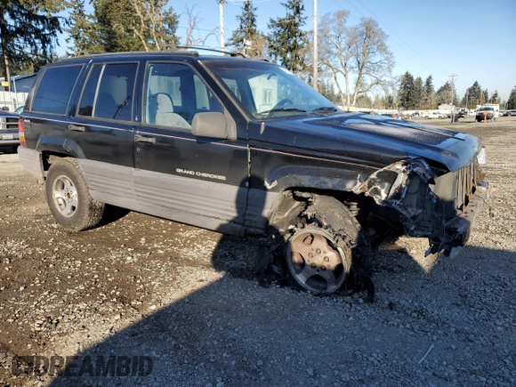 1998 Jeep Grand Cherokee Laredo with VIN 1J4GZ58S0WC106148, listed as a Copart auction lot 42855105 with 263,785 mi miles and Salvage Title. Bid and sale history available at carsss.com. Image 4.