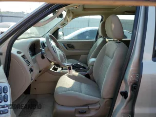 2005 Ford Escape XLT with VIN 1FMYU03115KA43989, listed as a Copart auction lot 69295484 with 160,309 mi miles and Salvage Title. Bid and sale history available at carsss.com. Image 7.